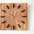 Hamba wall clock by Louw Roets