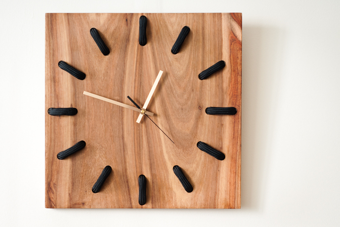 Hamba wall clock by Louw Roets